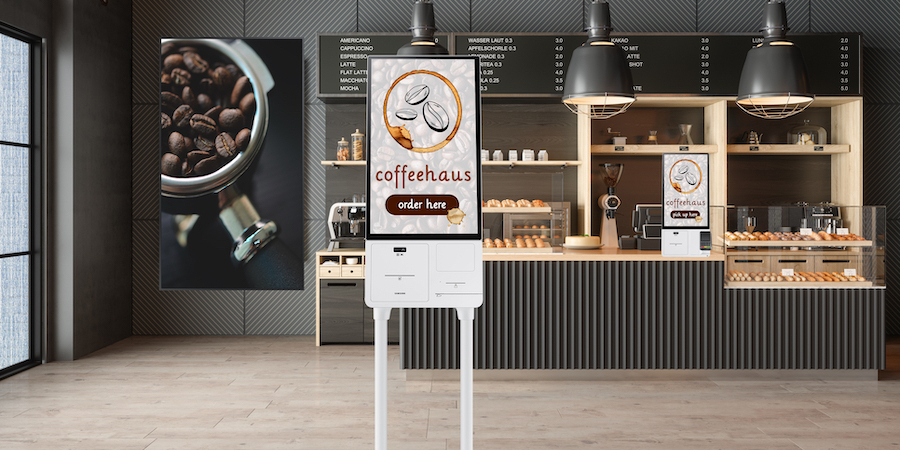Empty Coffee Shop Interior With Coffee Maker, Pastries And Blank Poster On The Wall